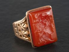 An intaglio, carnelian signet ring, possibly depicting Hermes, stamped '14',