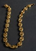 A 1970's, 18ct gold, fancy-link necklace, with import marks for London, 1976, total length ca. 39.