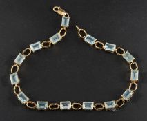 A 9ct gold, step-cut octagonal, aquamarine bracelet, total estimated aquamarine weight ca. 6.