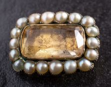 A Victorian foiled back citrine and pearl cluster brooch/ pendant, with inscription to verso,