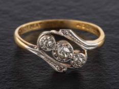 A single-cut diamond, three-stone ring, estimated total diamond weight ca. 0.