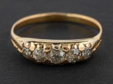 An early 20th century, old-cut diamond, five-stone ring, total estimated diamond weight ca.0.