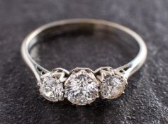 An old-cut diamond, three-stone ring, total estimated diamond weight ca. 1.