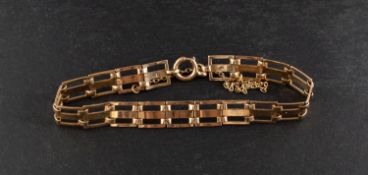 A gate-link bracelet, stamped '9CT', length ca. 18cm, total weight ca. 7.8gms.