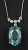 An oval, mixed-cut aquamarine and old-cut diamond pendant, estimated aquamarine weight ca. 11.
