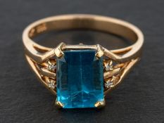 An octagonal step-cut blue topaz ring, estimated blue topaz weight ca. 2.