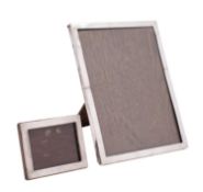 A George V silver photograph frame, maker Henry Williamson, Birmingham, 1917 of rectangular outline,