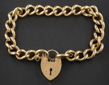 A 9ct gold curb-link bracelet with heart-shaped clasp, with hallmarks for London, 1992,
