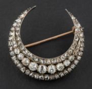 A Victorian, old, single and rose-cut diamond, crescent brooch,