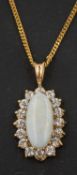 An oval, cabochon-cut opal and CZ cluster pendant, estimated opal weight ca. 0.