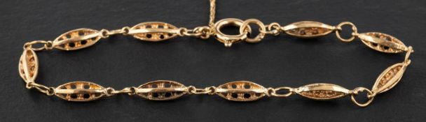 A 9ct gold, fancy-link bracelet, with hallmarks for London, 1979, total length ca. 19.