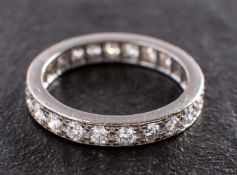 A round, brilliant-cut diamond full eternity ring, total estimated diamond weight ca. 1.