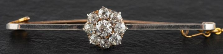 An old-cut diamond cluster bar brooch, total estimated diamond weight ca. 0.