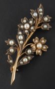 A 9ct gold, cultured and seed pearl floral spray brooch, with hallmarks for Birmingham, 1979,