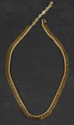 A 9ct gold fringe necklace, with import marks for Birmingham, 1978, total length ca.