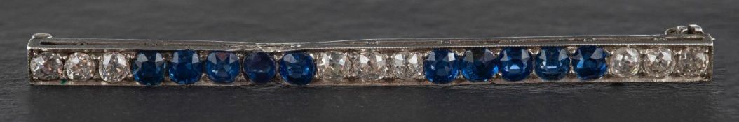 An early 20th century, old-cut diamond and mixed-cut sapphire bar brooch,