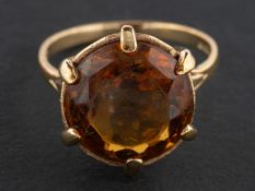A 1960's, 9ct gold, round, mixed-cut citrine ring, estimated citrine weight ca.