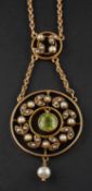 An early 20th century, garland style, openwork wreath, peridot, seed pearl and pearl pendant,
