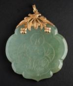 An engraved jade pendant, depicting 'Hotei Budai' to front with four characters to verso,