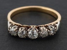 A round brilliant and old-cut diamond five-stone ring, total estimated diamond weight ca. 0.