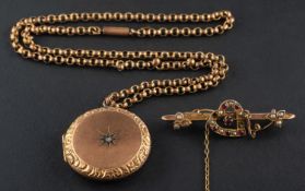 A 9ct gold, Edwardian, ruby and seed pearl 'witches heart' bar brooch and a circular,