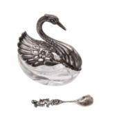 A Continental clear glass and silver mounted swan salt and spoon, bears import marks, 7.5cm.