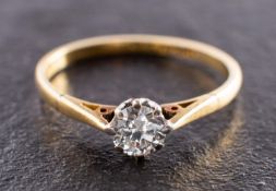 A round, brilliant-cut diamond single-stone ring, estimated diamond weight ca. 0.
