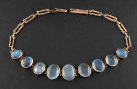 An oval, cabochon-cut moonstone gate-link bracelet, total estimated moonstone weight ca.