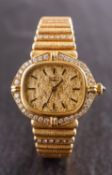 Longines, a dress wristwatch, the textured dial with baton markers and hands,