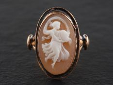 A shell cameo ring depicting Euphrosyne, the goddess of joyfulness, length of ring head ca. 2.