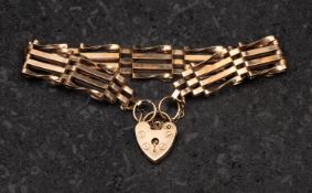 A 9ct gold, gate-link bracelet with heart-shaped clasp, with hallmarks for Birmingham, 1977,