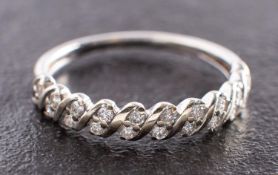 A 9ct gold, round, brilliant-cut diamond, half-eternity ring, total estimated diamond weight ca. 0.