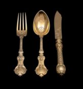 A set of German silver gilt dessert cutlery, maker court goldsmiths SY & Wagner,