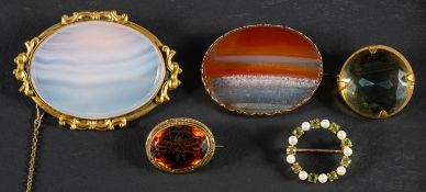 Five gemset brooches, including a 9ct gold, peridot and cultured pearl wreath brooch,