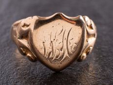 A 9ct gold signet ring, with indistinct engraved monogram and hallmarks for Birmingham, 1918,