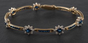 An oval, mixed and calibre-cut sapphire and single-cut diamond cluster bracelet,