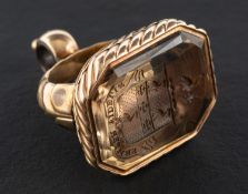 A 19th century, citrine signet fob, engraved with armorial and motto 'Semper Fidelis',