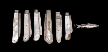 A collection of silver folding fruit knives with mother-of-pearl handles, various makers and dates,