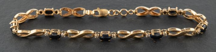 An oval, mixed-cut sapphire and single-cut diamond bracelet, with figure of '8' links,