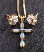 A 9ct gold, opal and single-cut diamond, cruciform pendant and opal flowerhead ear studs,