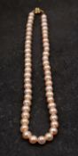 A cultured pearl necklace,