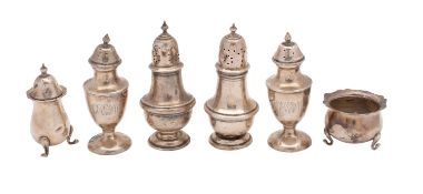 A mixed collection of assorted silver condiments, various makers and dates,