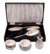 An Elizabeth II silver and enamel matched dressing table set, maker Adie Brothers, various dates,