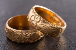 Two Victorian, 18ct gold rings with engraved decoration,