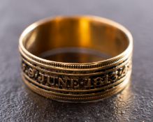 A Georgian black enamel mourning ring, the enamel spelling out 'J FENN OB 9 JUNE 1813 AET 31',