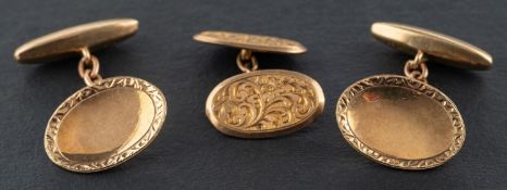 A pair of 9ct gold, oval cufflinks, with foliate engraved border, length of cufflink head ca.