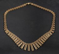 A panther-link, graduated fringe necklace, stamped '9K', total length ca. 40.5cm, total weight ca.