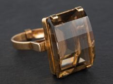 A 9ct gold, fancy-cut smokey quartz dress ring, with hallmarks for London, 1972,