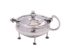 A George V silver mustard pot and cover, maker A Edward Jones Ltd, Birmingham,