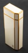A Must de Cartier gold plated and cream lacquer lighter, numbered G95716 total length ca.